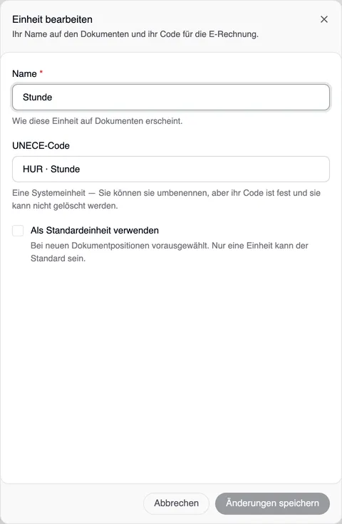 Das Fenster „Einheit bearbeiten“ für Stunde: das Feld Name ist bearbeitbar, der UNECE-Code „HUR · Stunde“ ist fest, darunter „Eine Systemeinheit — Sie können sie umbenennen, aber ihr Code ist fest und sie kann nicht gelöscht werden.“, dann das Kästchen Als Standardeinheit verwenden, Abbrechen und Änderungen speichern.