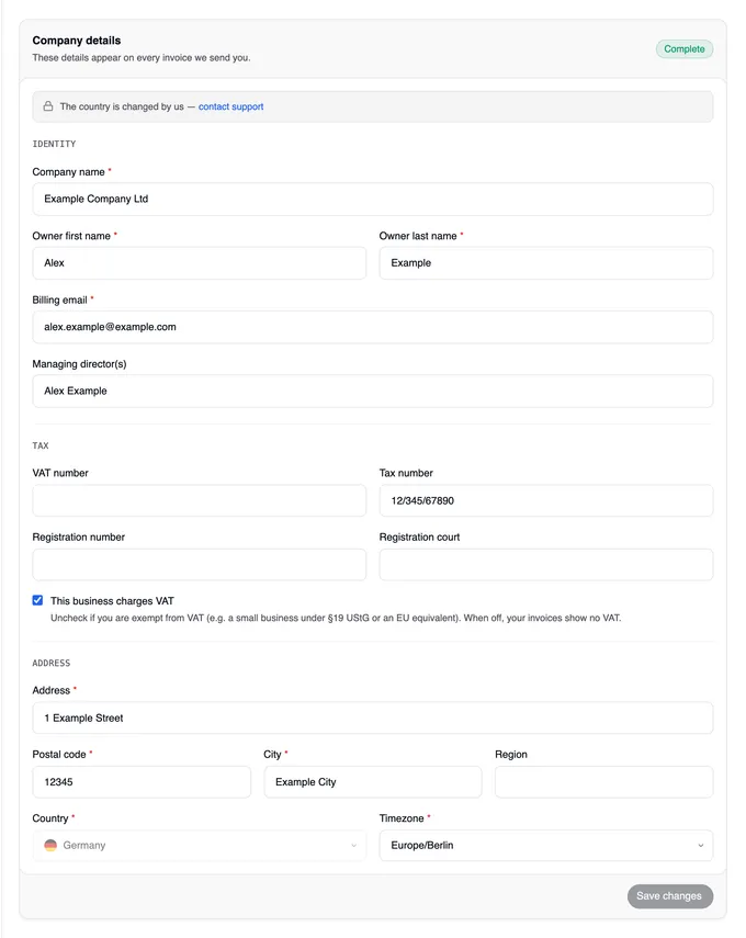 The “Company details” card marked “Complete”, below the title the note “The country is changed by us — contact support”, the sections Identity, Tax and Address filled in with sample data of Example Company Ltd — the country Germany greyed out —, and the “Save changes” button at the bottom.
