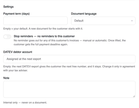 The “Settings” section in the “Edit customer” window: payment term, document language, the reminder stop and the empty DATEV debtor account field reading “Assigned at the next export” with the note below it, then the note.