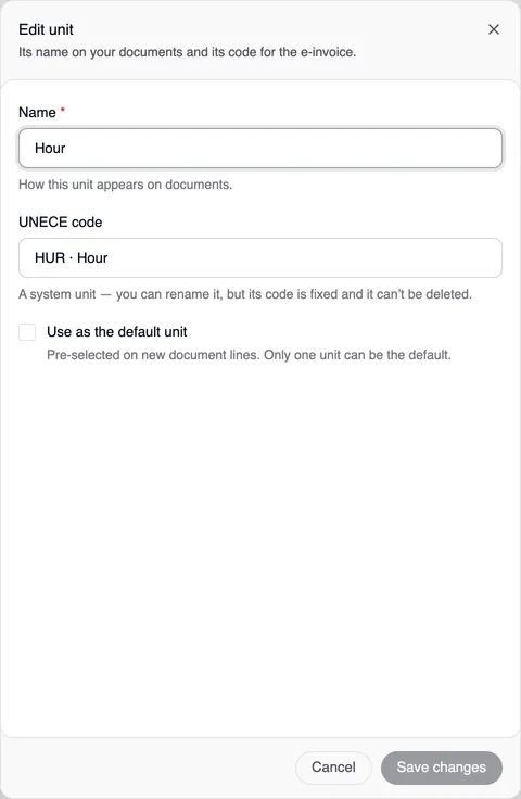 The “Edit unit” window for Hour: the Name field can be edited, the UNECE code “HUR · Hour” is fixed, below it “A system unit — you can rename it, but its code is fixed and it can’t be deleted.”, then the Use as the default unit box, Cancel and Save changes.