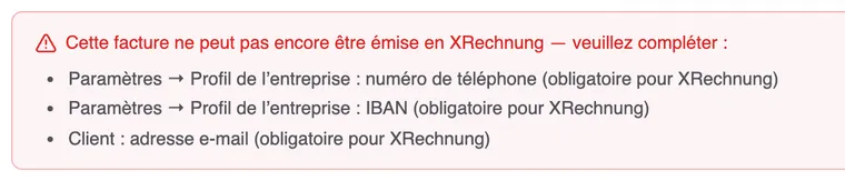 L’avis rouge dans l’éditeur : « Cette facture ne peut pas encore être émise en XRechnung — veuillez compléter : », suivi des informations manquantes, comme le numéro de téléphone et l’IBAN du profil de l’entreprise et l’adresse e-mail du client, chacune « obligatoire pour XRechnung ».